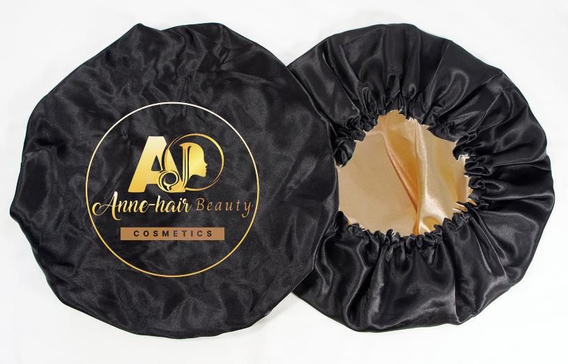 Black Satin Hair Bonnet by Anne Hair Beauty for protecting hair during sleep, reducing frizz, retaining moisture, and preventing breakage.